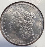 1886-S Morgan Silver Dollar, Choice MS60+. (12999).