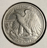 1920-D Walking Liberty Half Dollar, Choice AU.  (19834)