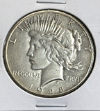 1928 Peace Silver Dollar, Choice AU. (22086)