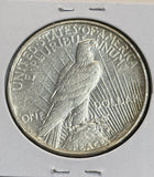 1934-D Peace Silver Dollar, Choice AU. (22090)