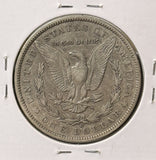 1890-O Morgan Silver Dollar, Nicely Circulated. (23650)