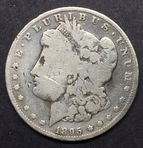 1895-O Morgan Silver Dollar. F